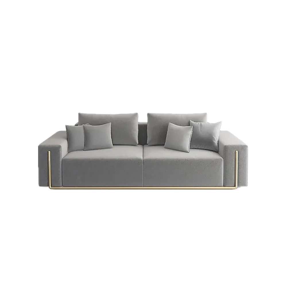 Grey geometric sofa with gold frame, three back cushions, and four matching throw pillows