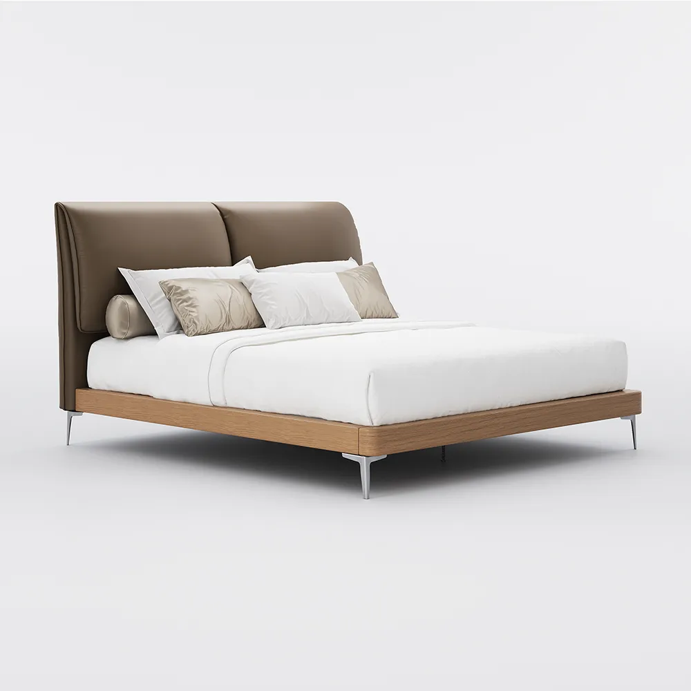 Queen-size coffee faux leather bed with metal legs, gray bedding, and wooden nightstands in a modern bedroom.