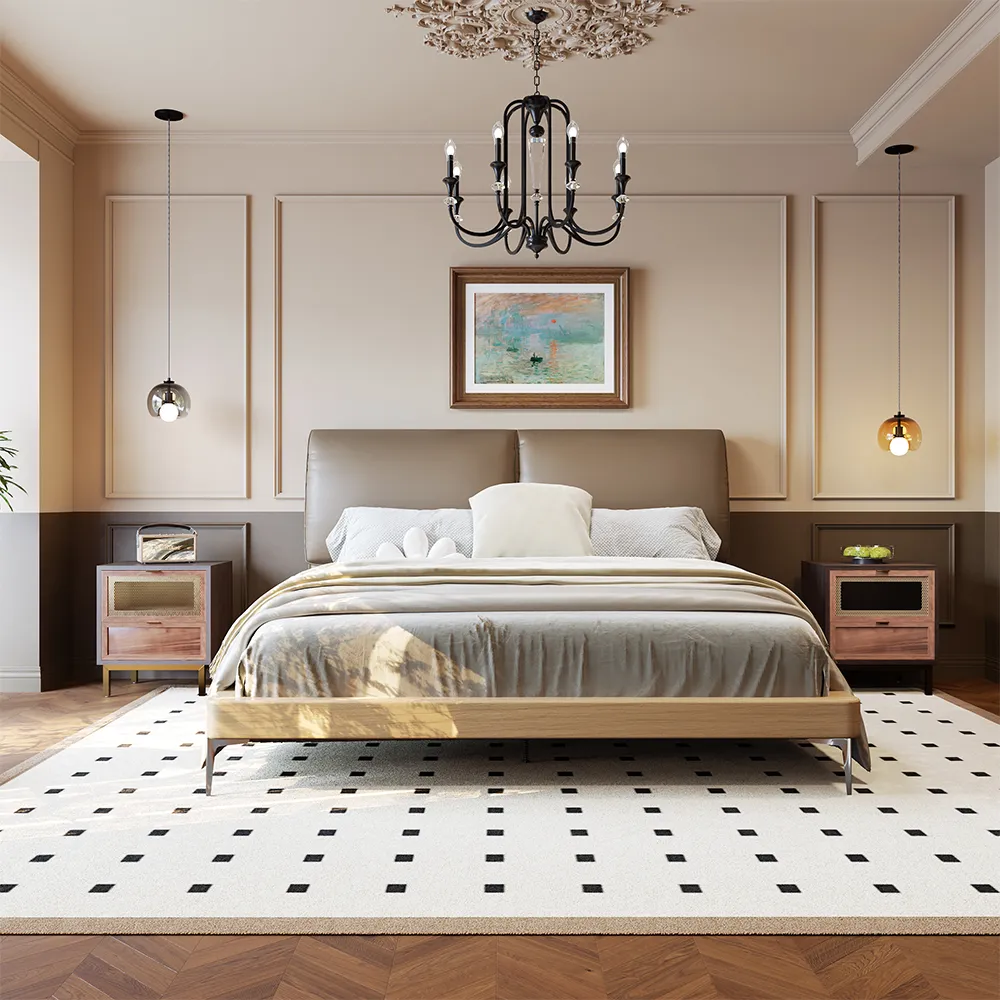 Queen-size coffee faux leather bed with metal legs, gray bedding, and wooden nightstands in a modern bedroom.