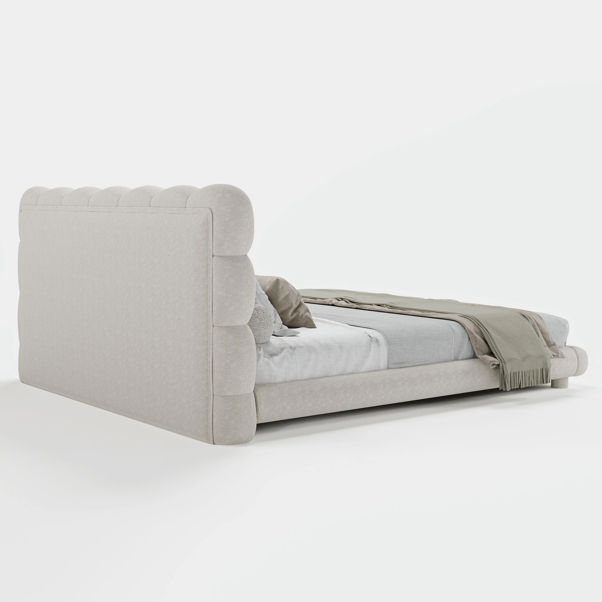 White boucle upholstered bed with tufted headboard, beige bedding, and matching nightstands in a modern bedroom.