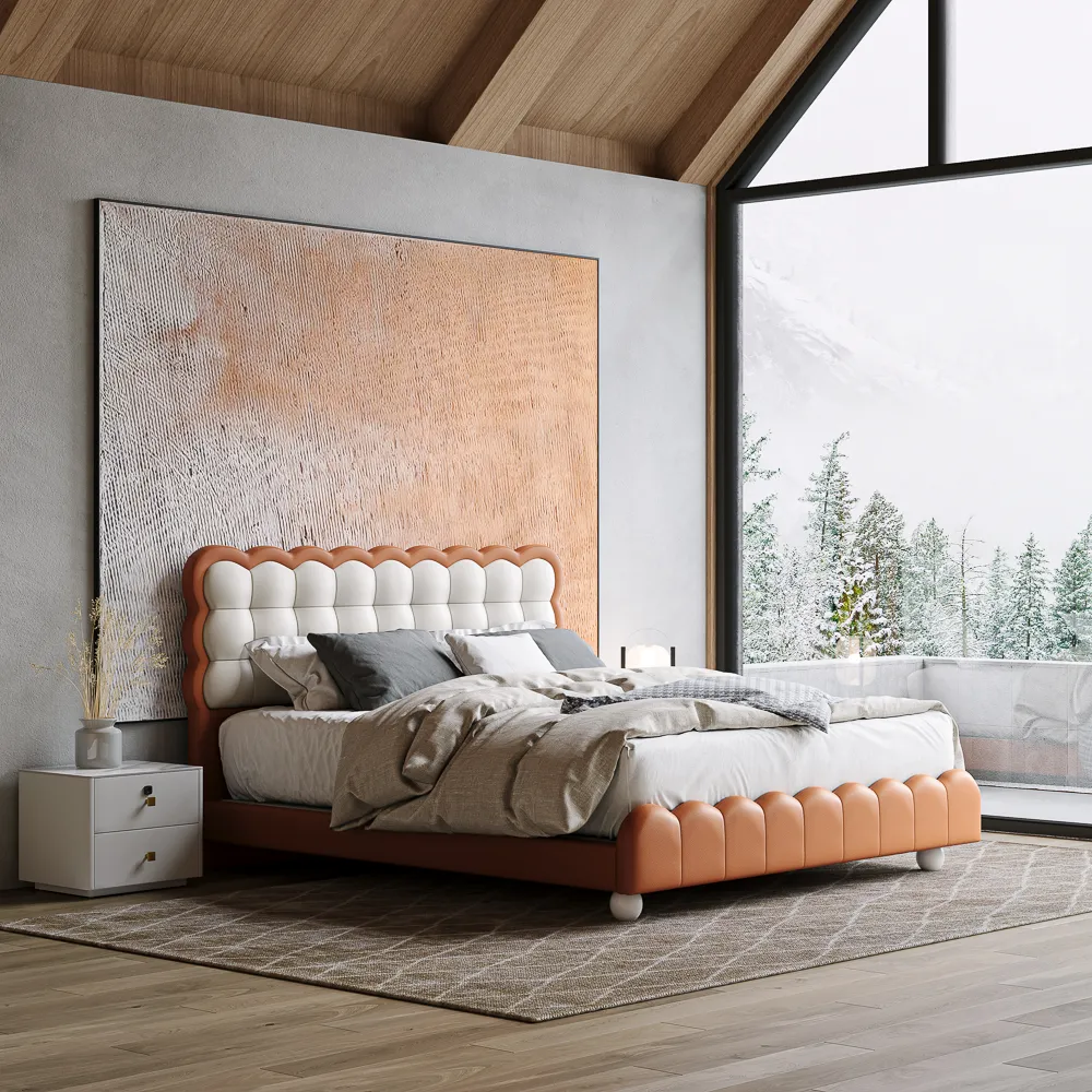 A contemporary bedroom featuring the Cove Leather Bed in white and orange, with a scalloped headboard and footboard design.