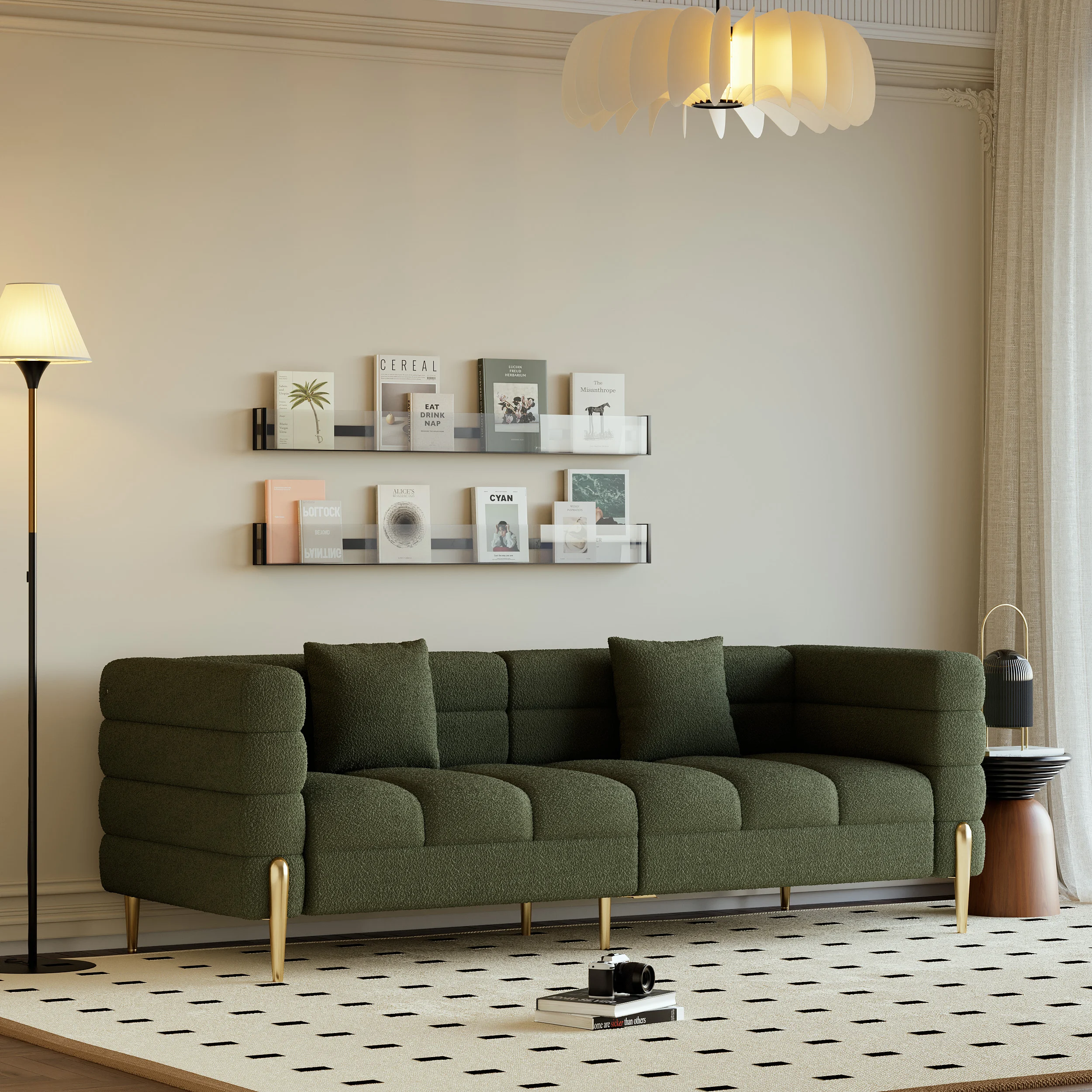 Dark green upholstered 3-seater sofa with gold legs and throw pillows in a modern living room