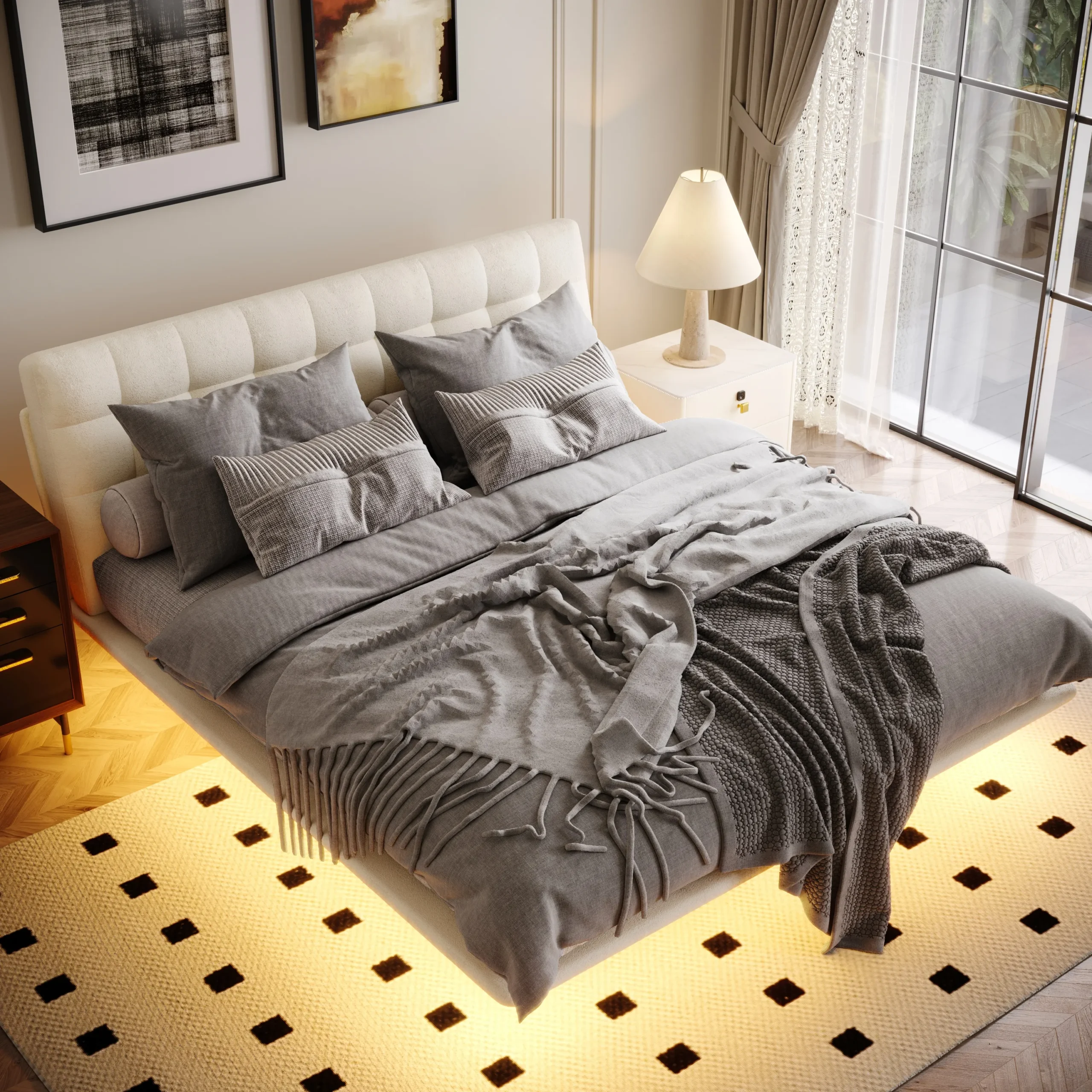 A modern bedroom featuring a neatly made bed with a padded headboard and white comforter.