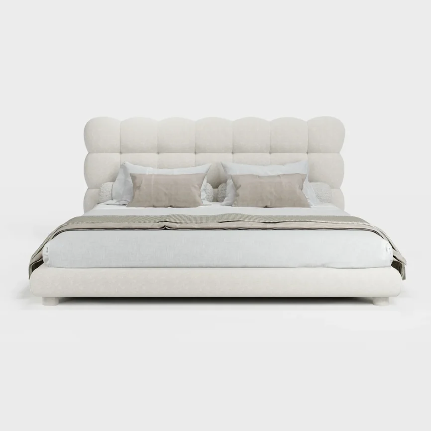 A luxurious bedroom featuring a cream upholstered platform bed with a tufted headboardA luxurious bedroom featuring a cream upholstered platform bed with a tufted headboard