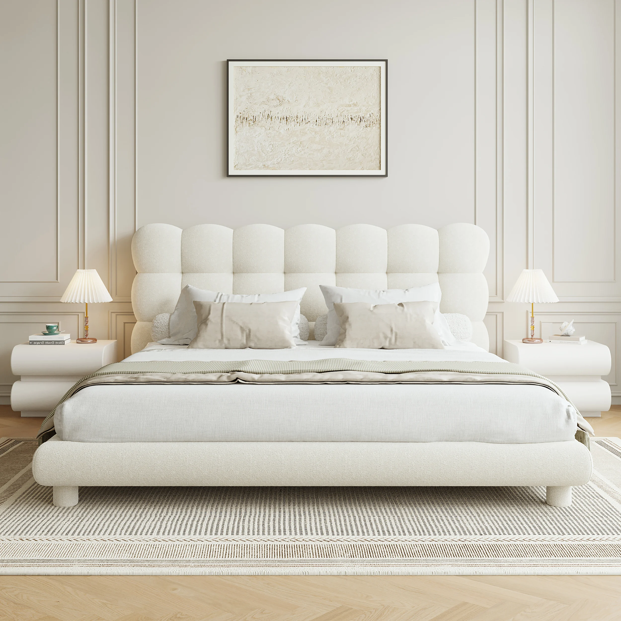 Cream upholstered platform bed with tufted headboard in a modern bedroom with neutral decor and panel molding