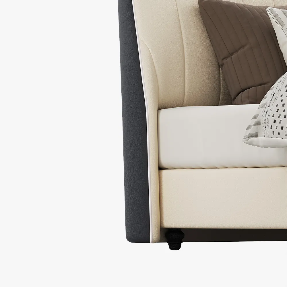 A modern bedroom featuring the Luna Beige Leather Bed, styled with a neutral-toned comforter and five decorative pi