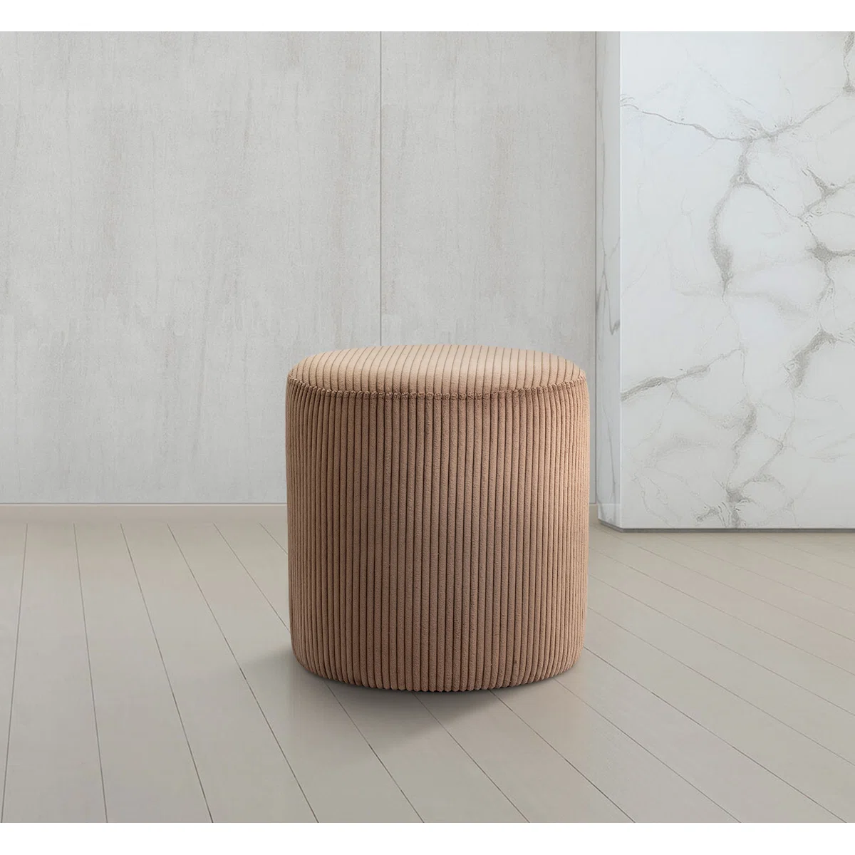 light brown ribbed velvet ottoman with cylindrical shape on wooden floor in modern interior