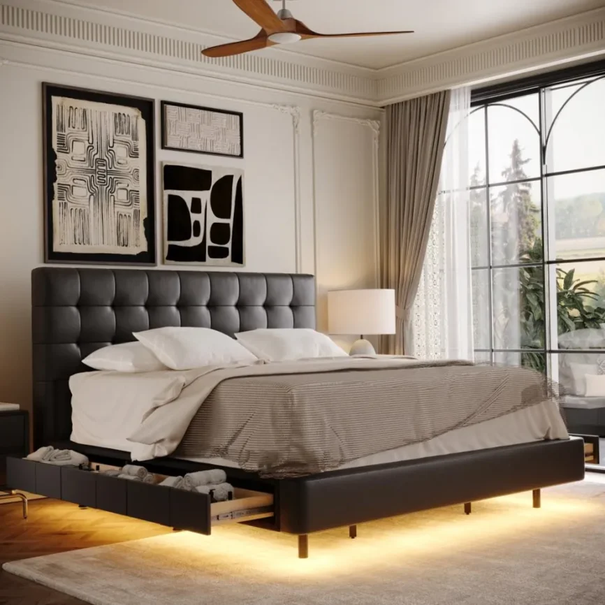 Dark tufted bed with white pillows, striped blanket, and ambient lighting in a modern bedroom.