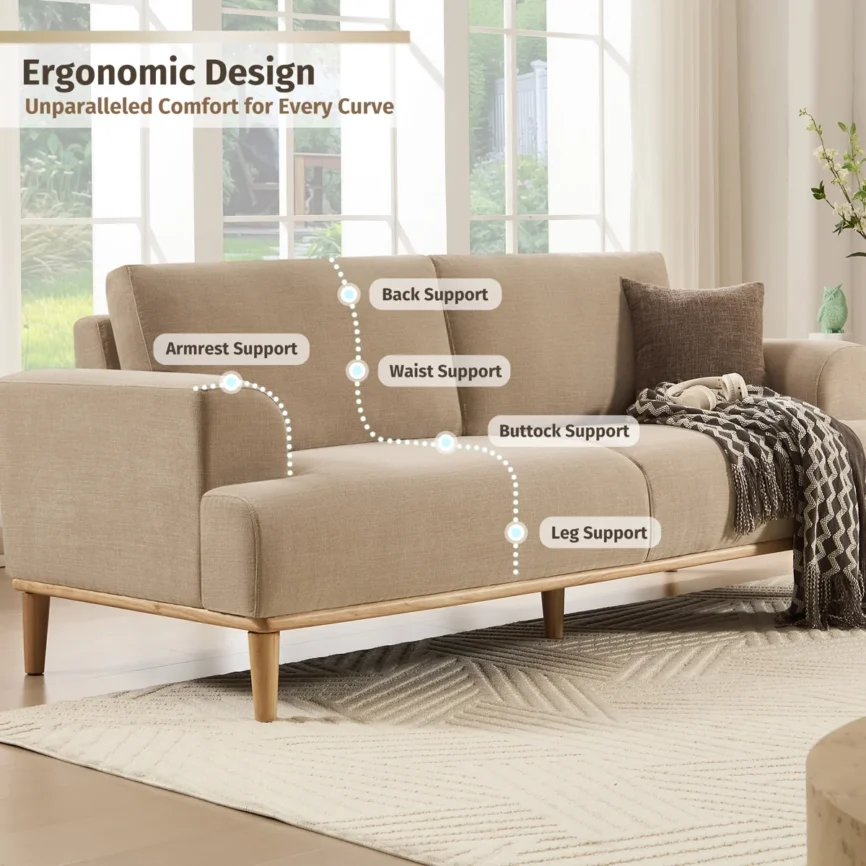 Beige sofa with wooden base and legs in a minimalist living room with neutral tones