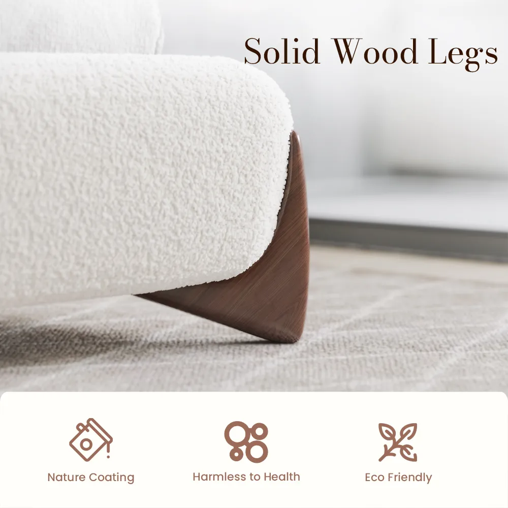 A minimalist upholstered bed in textured white boucle fabric with rounded edges and outward-curving wooden legs.