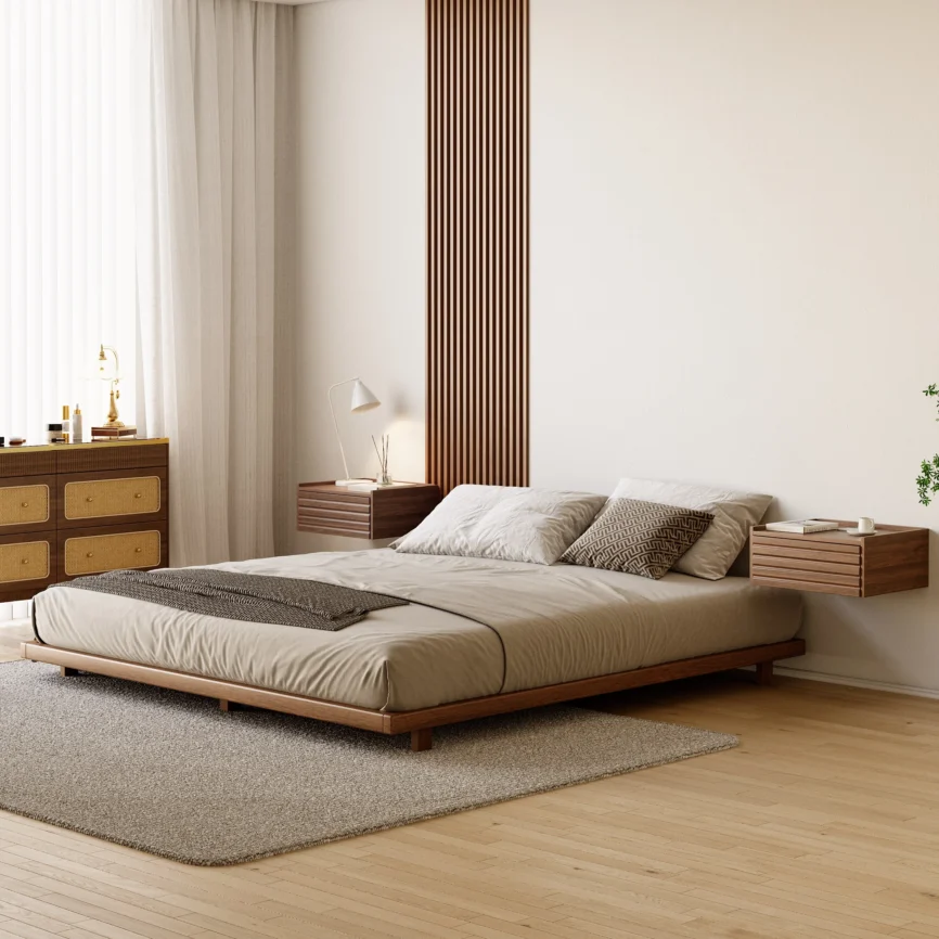 A minimalist bedroom featuring a low-profile wooden bed with a matching headboard and neutral bedding in beige and gray tones