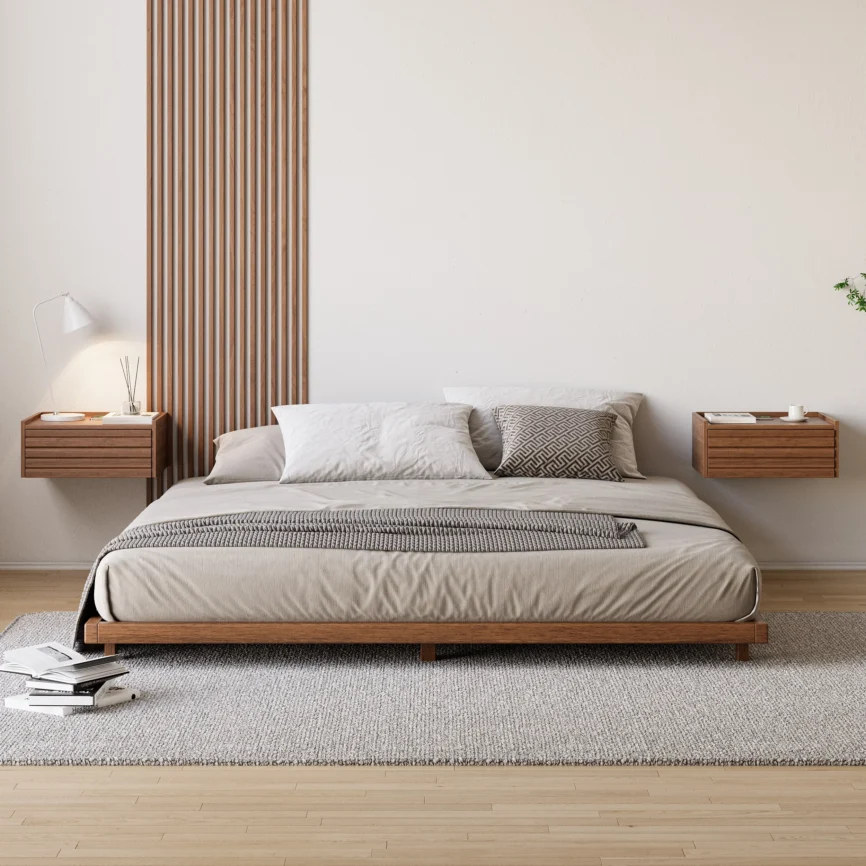 Wooden bed with beige and gray bedding, floating nightstands, and geometric pillow in a minimalist bedroom