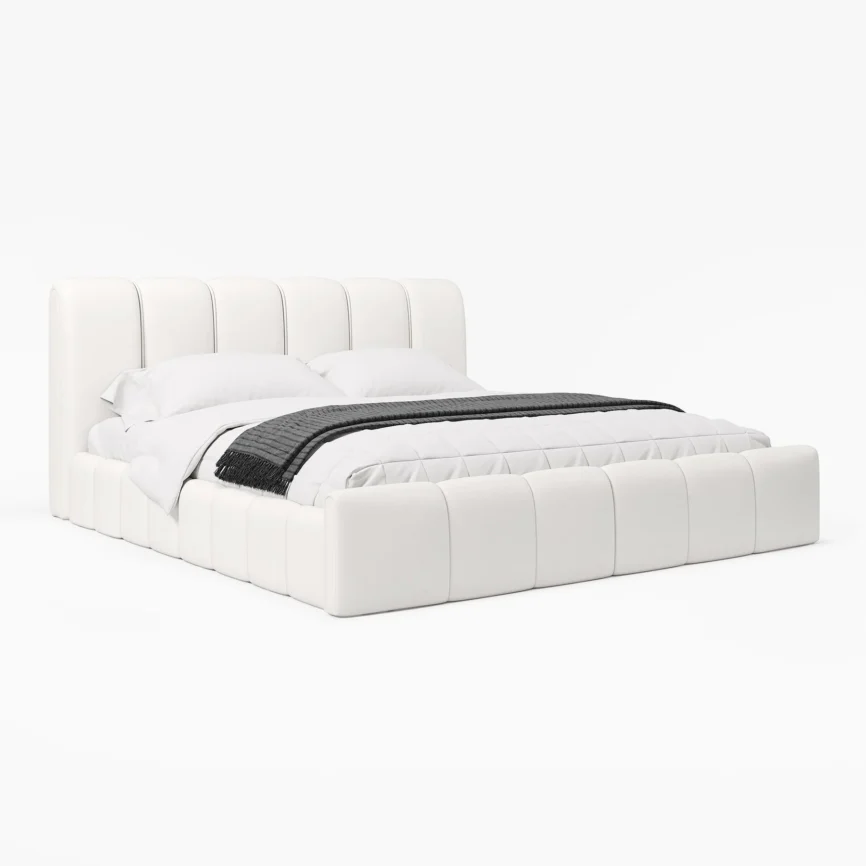 A modern bedroom featuring a white upholstered bed with a tall, vertically paneled headboard and matching footboard.