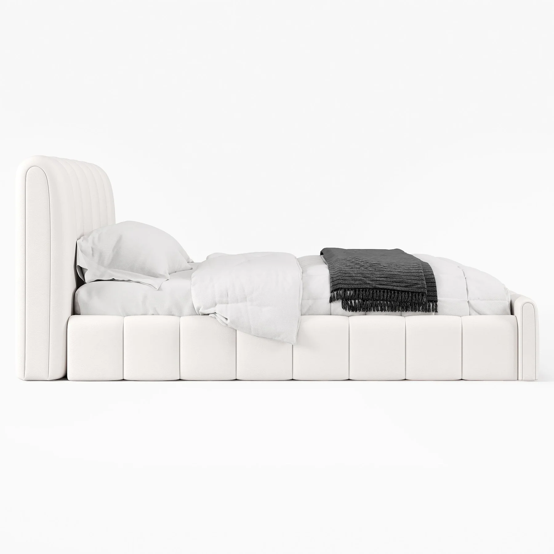 A modern bedroom featuring a white upholstered bed with a tall, vertically paneled headboard and matching footboard.