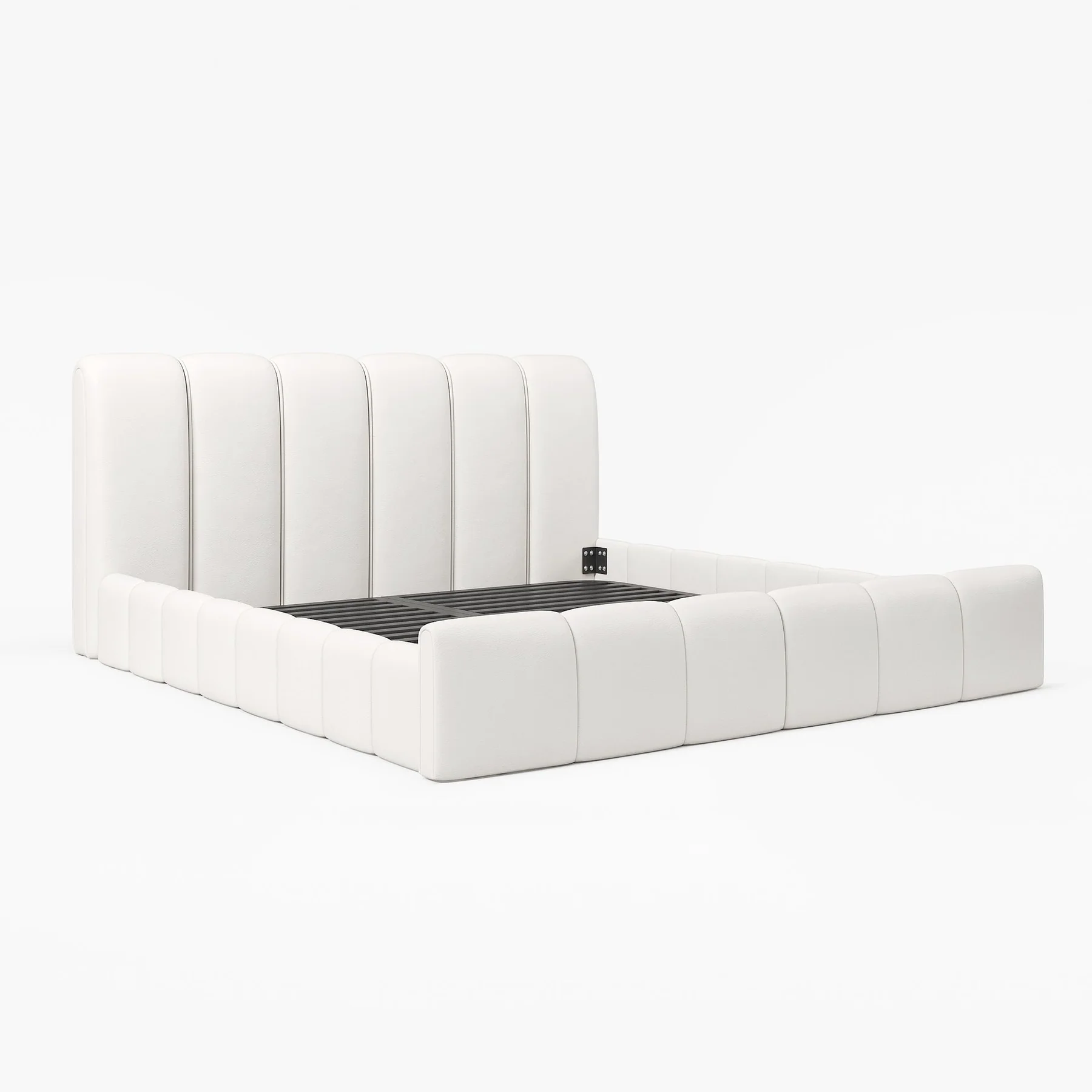 A modern bedroom featuring a white upholstered bed with a tall, vertically paneled headboard and matching footboard.