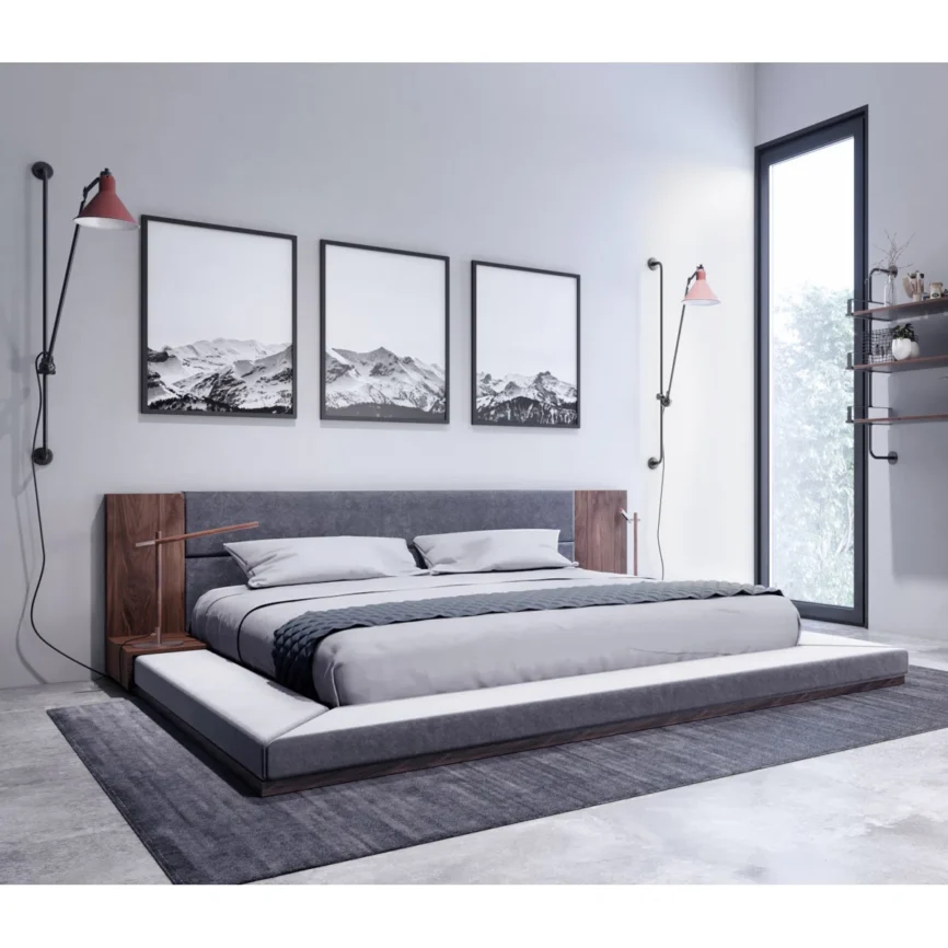 Grey upholstered platform bed with oak nightstands, channeled headboard, and minimalist bedding in a modern bedroom.