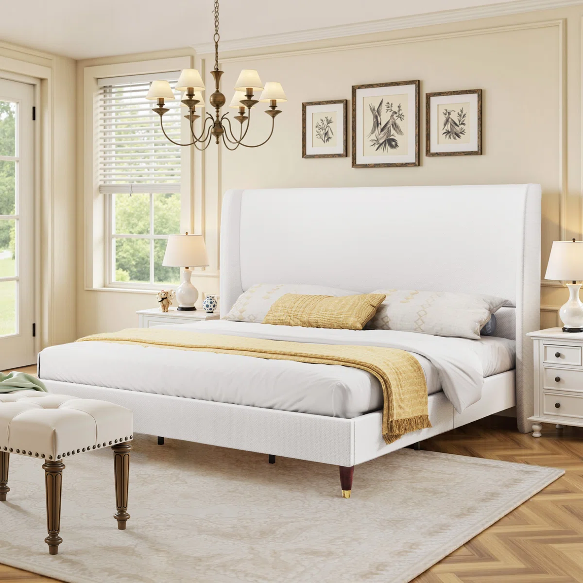 White upholstered bed with ribbed headboard, layered pillows, beige throw, and wooden nightstands in a neutral bedroom.