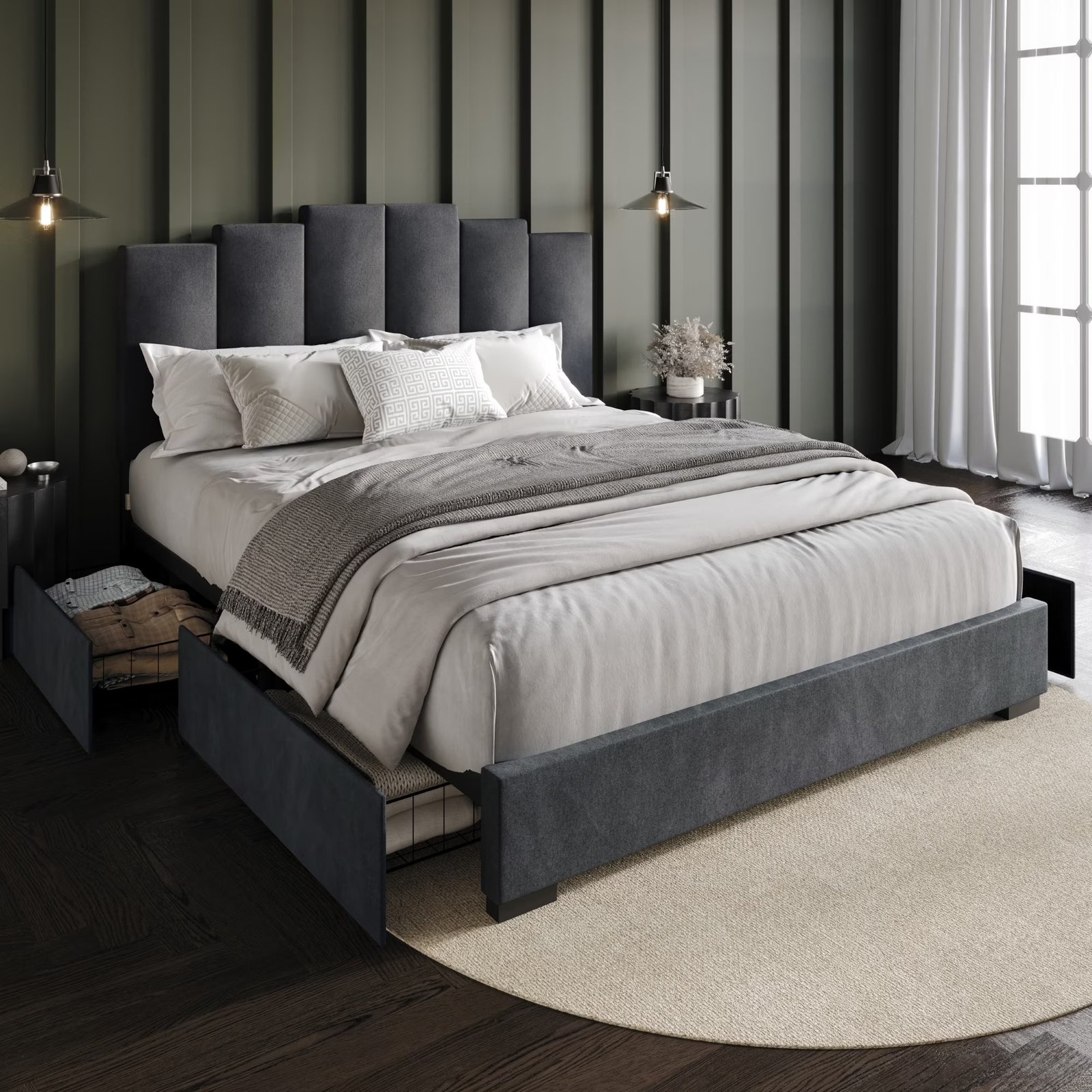 Dark gray velvet bed with stepped headboard, gray bedding, and round nightstands in a modern bedroom.