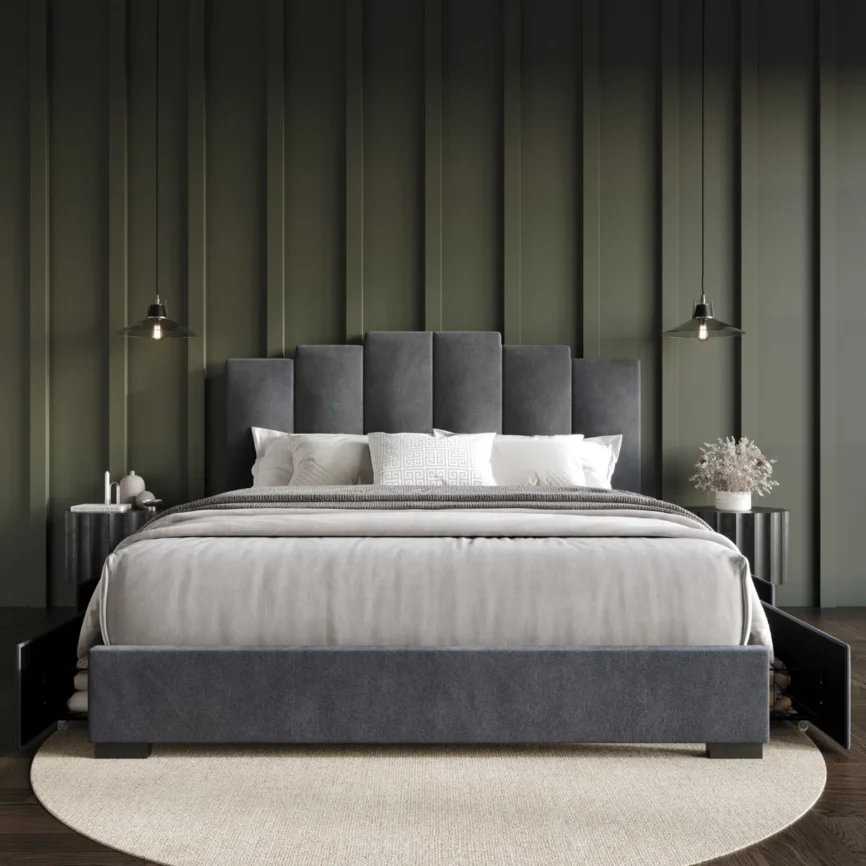 Dark gray velvet bed with stepped headboard, gray bedding, and round nightstands in a modern bedroom.