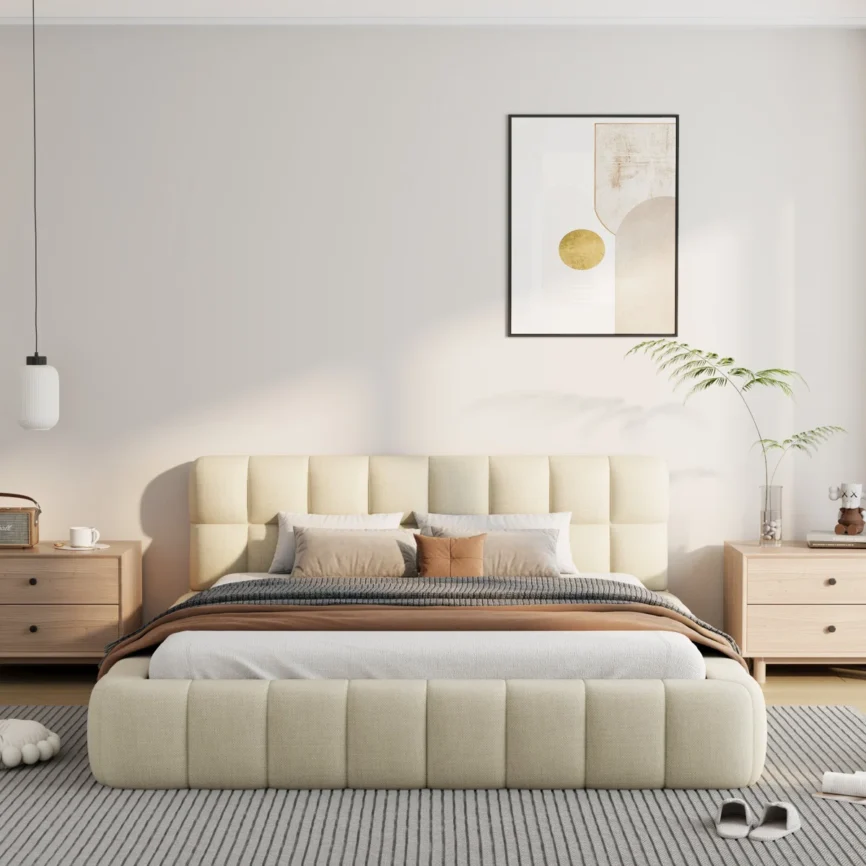 Beige upholstered bed with grid-patterned headboard, layered bedding, and light wood nightstands in a modern bedroom.