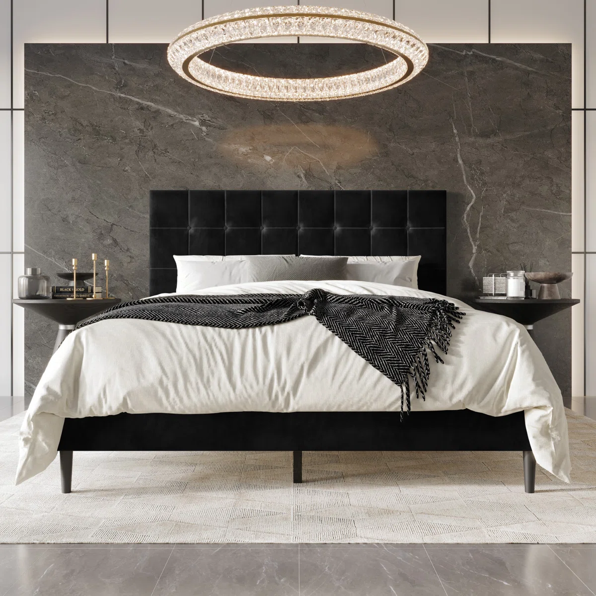 Black velvet bed with grid-tufted headboard, white bedding, and herringbone throw in a modern bedroom.