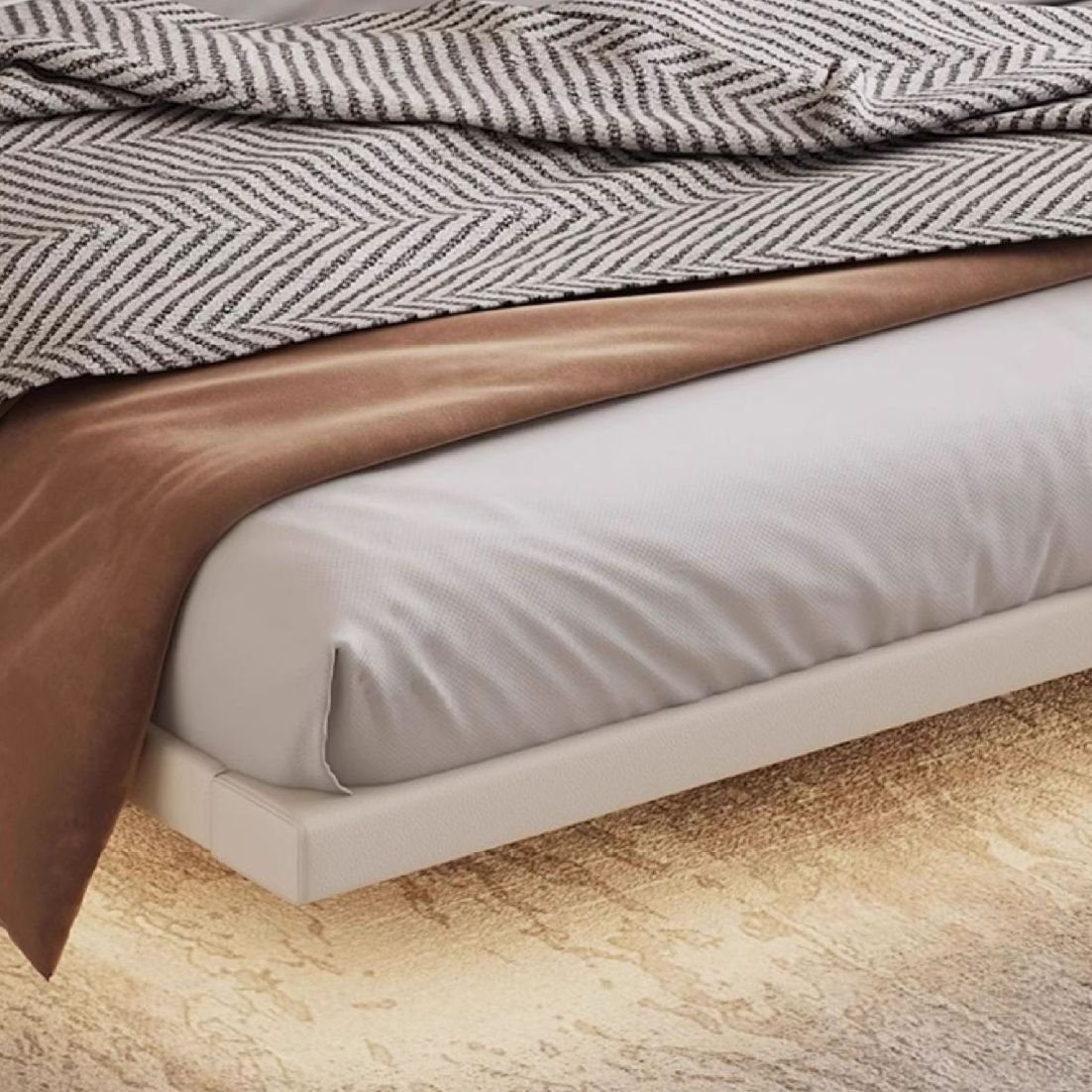 White shell-shaped upholstered bed with neutral bedding, gold-accented nightstands, and warm modern decor.