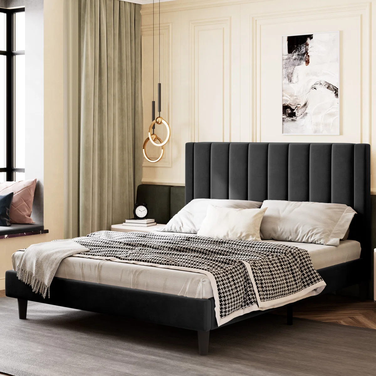Black velvet bed with vertical tufted headboard, white bedding, and checkered blanket in a modern bedroom.