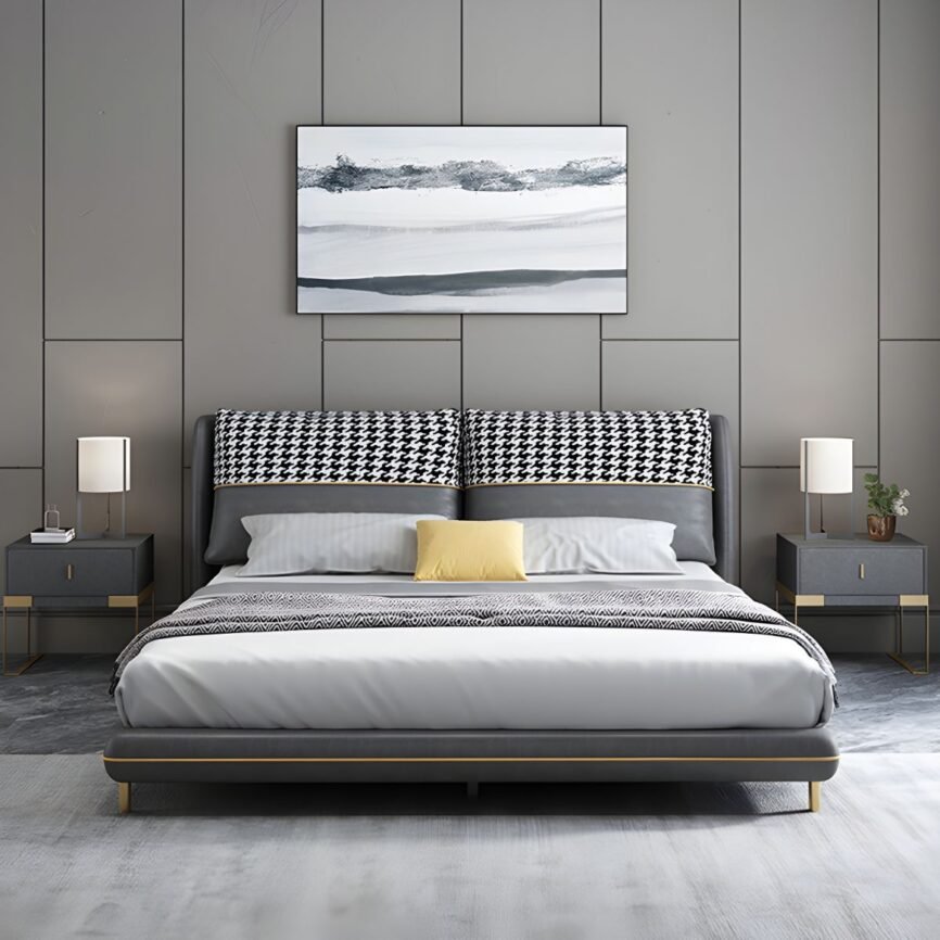 Dark gray bed with houndstooth headboard, white and yellow pillows, and gray paneled wall in modern bedroom.