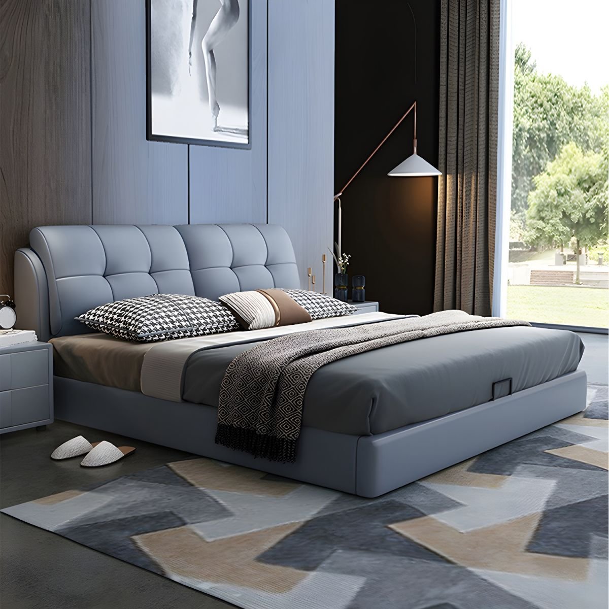 Grey tufted bed with patterned pillows, wood-paneled wall, and symmetrical nightstands in a modern bedroom.