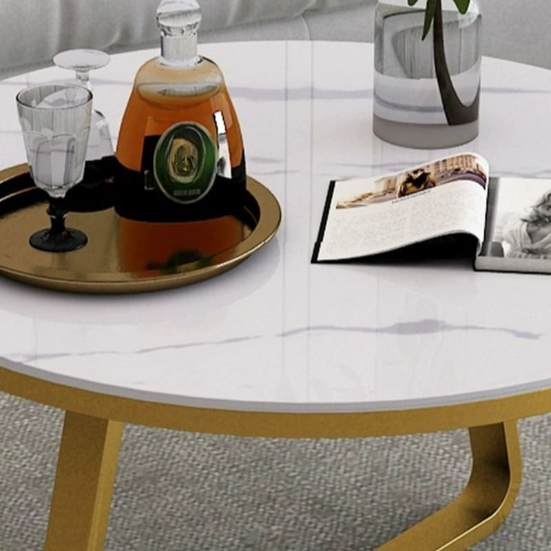 aris round glass coffee table with cross‑leg base