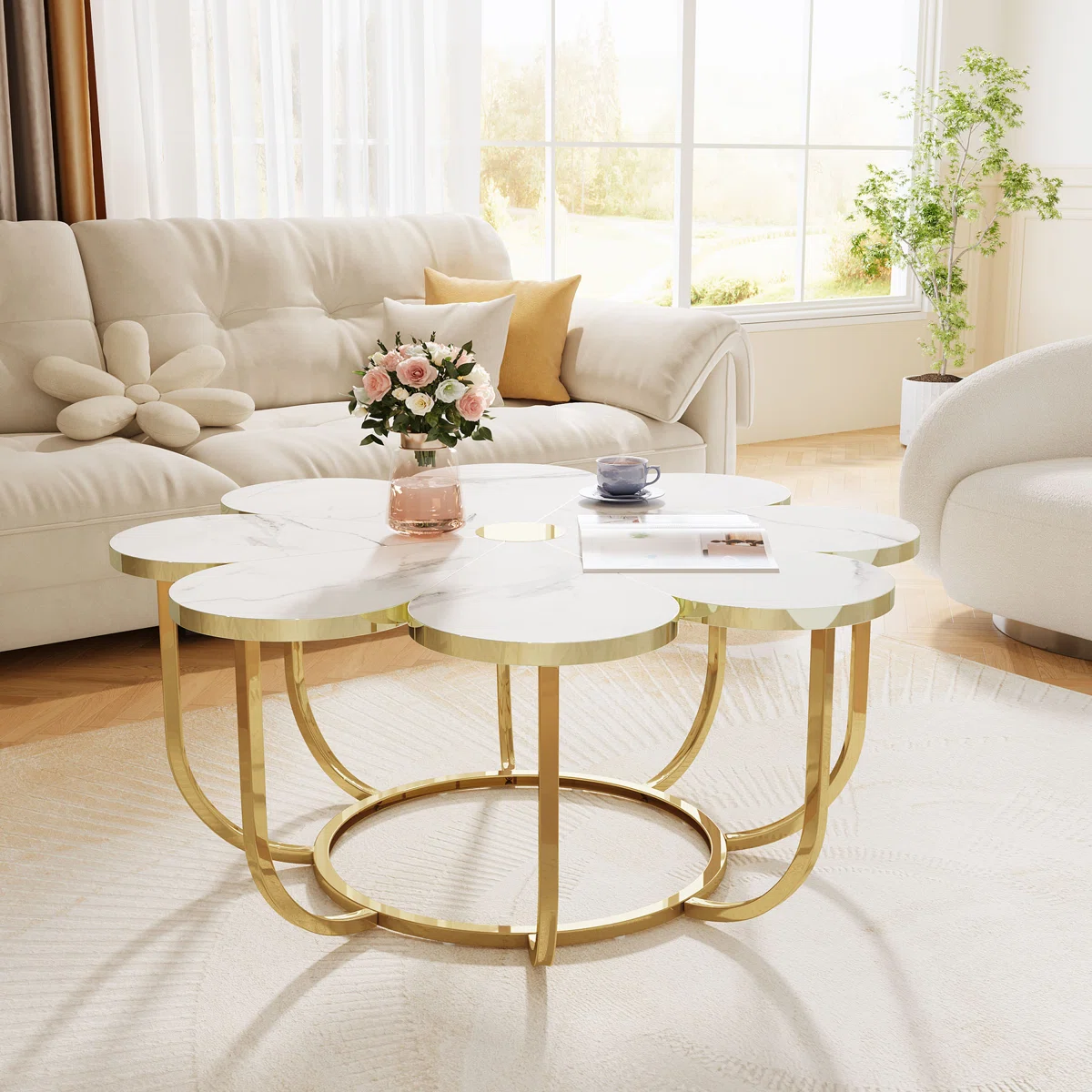 flower‑shaped coffee table with marble‑look top and gold frame