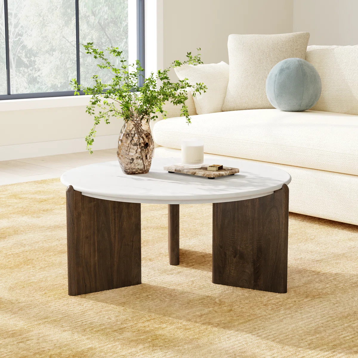 brecken round marble top coffee table with mango wood leg