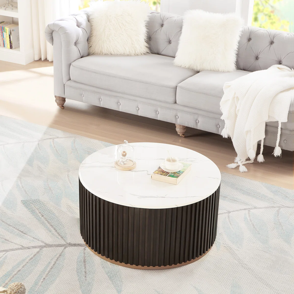 round drum coffee table with faux marble lid and hidden storage