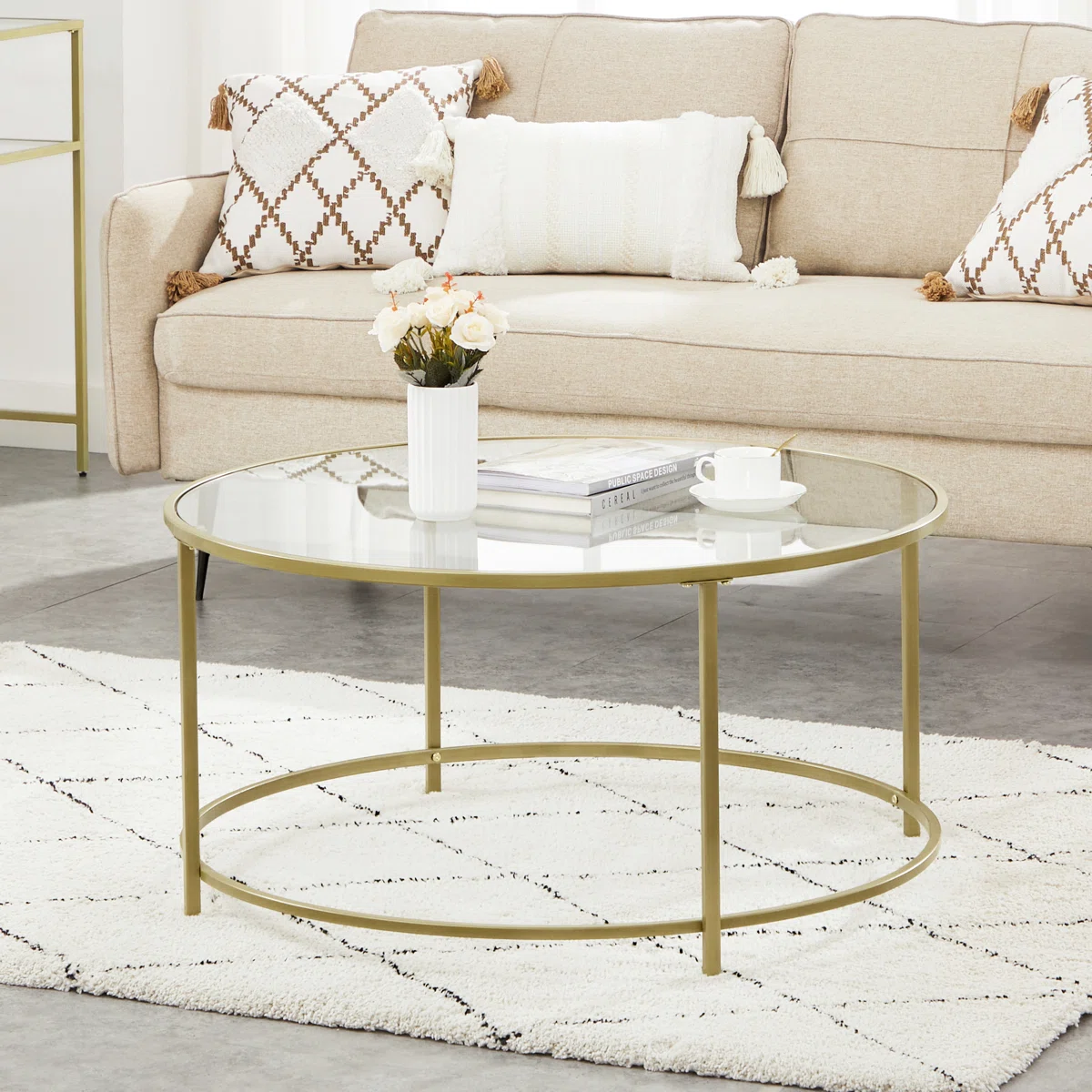 doynton round glass coffee table with gold steel frame
