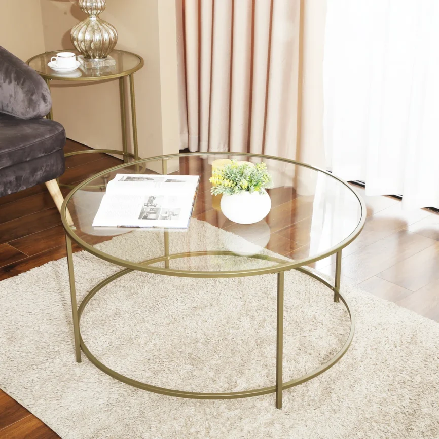 doynton round glass coffee table with gold steel frame