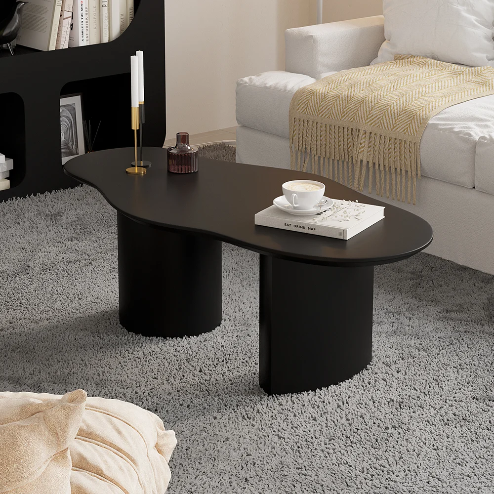 Kumo Eclipse Coffee Table with abstract cloud-shaped silhouette, black engineered wood top, and double pedestal base—modern Japandi design for living rooms.