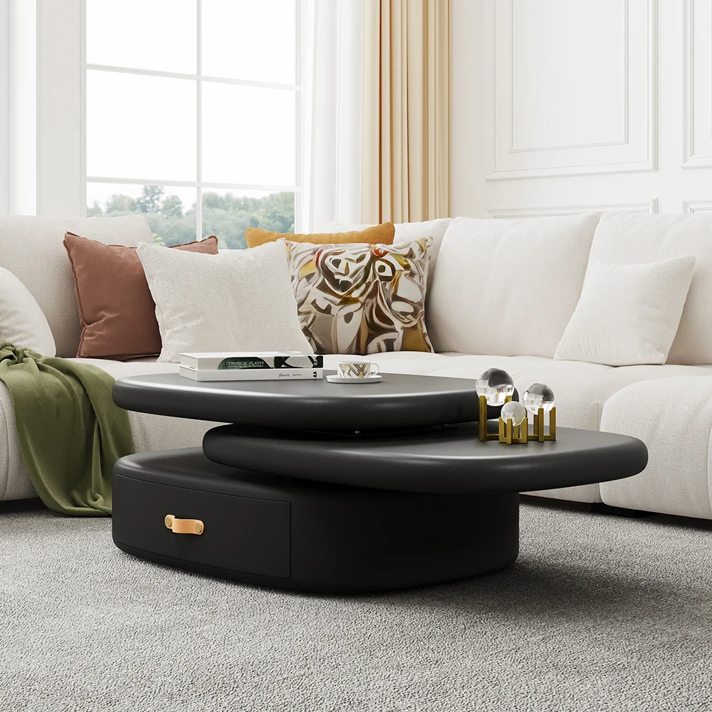 luna rotating oval coffee table with pebble design and black finish