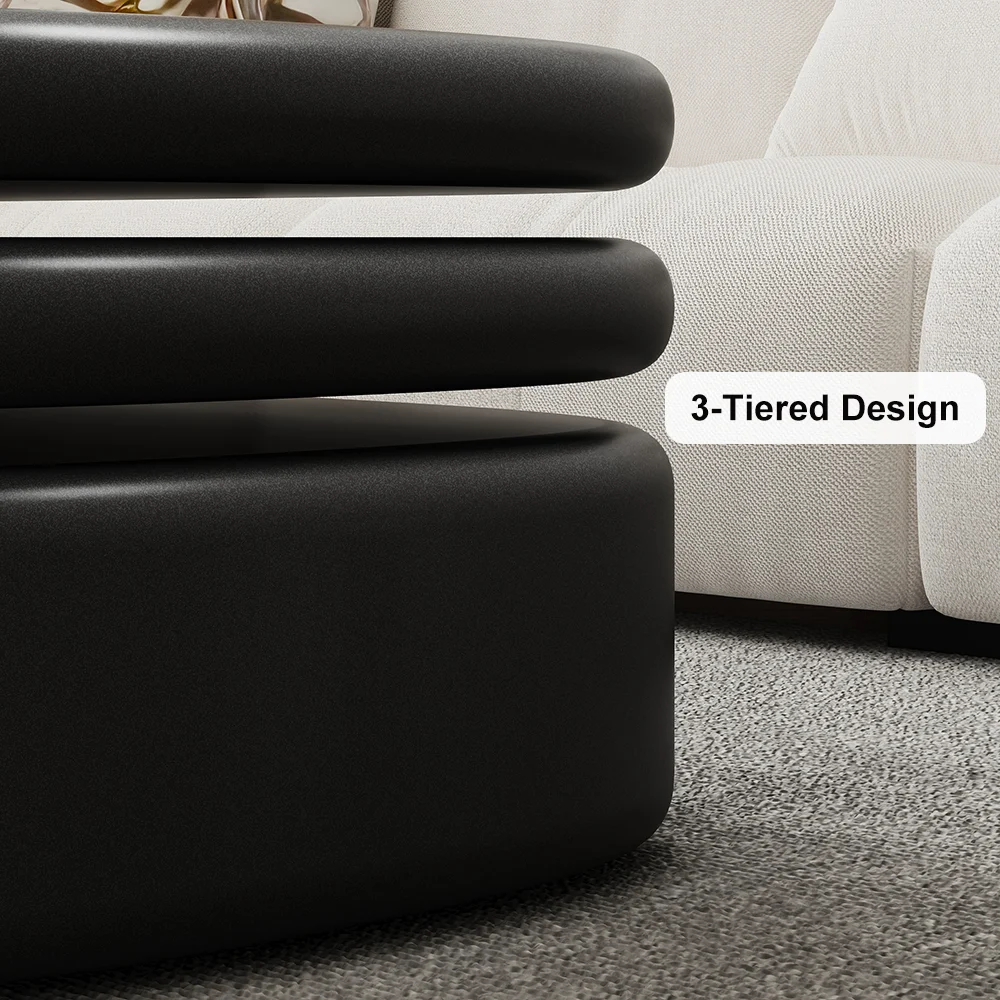 luna rotating oval coffee table with pebble design and black finish