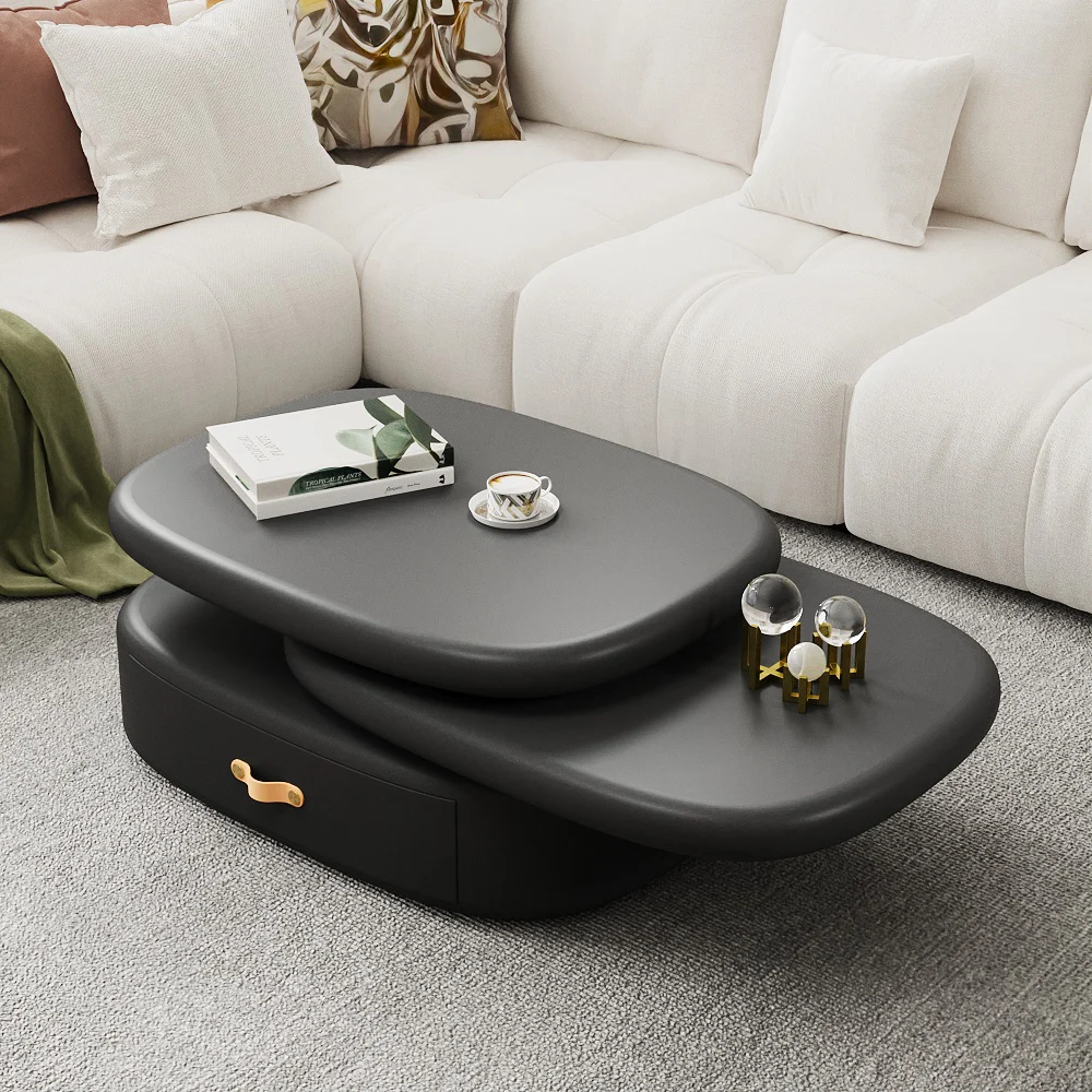 luna rotating oval coffee table with pebble design and black finish
