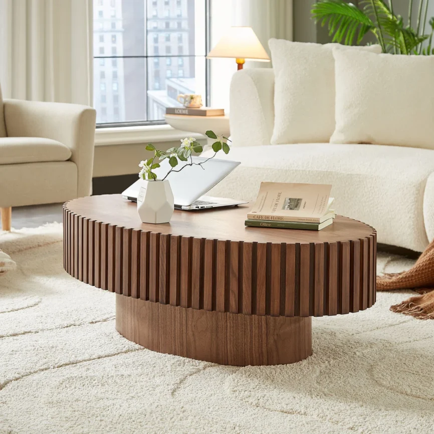 mdf oval coffee table with walnut finish and pedestal base