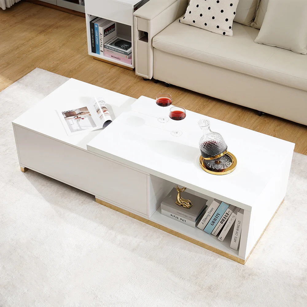 Modern extendable glossy white coffee table with stainless steel base, two drawers, and open storage.