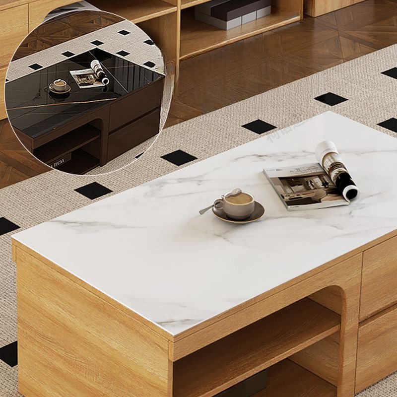 Modern coffee table with sintered stone rectangular top, natural wood block base, four drawers, and two open shelves