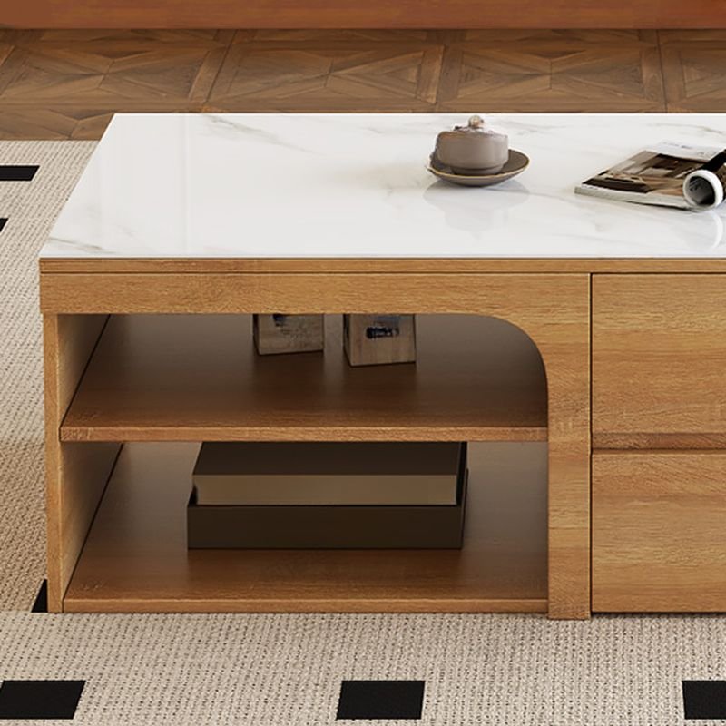 Modern coffee table with sintered stone rectangular top, natural wood block base, four drawers, and two open shelves