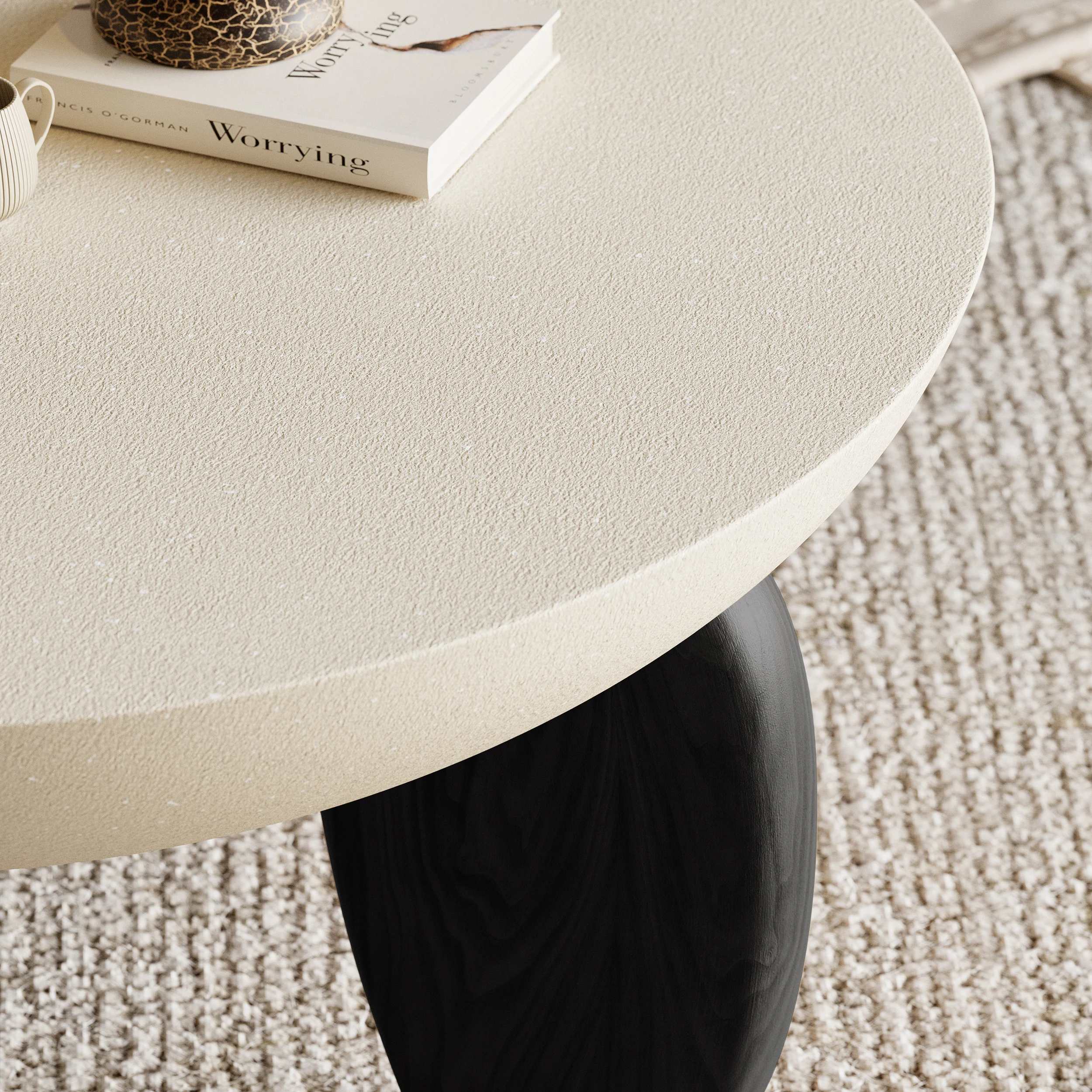 terra round concrete coffee table with ash wood legs and desert sand finish