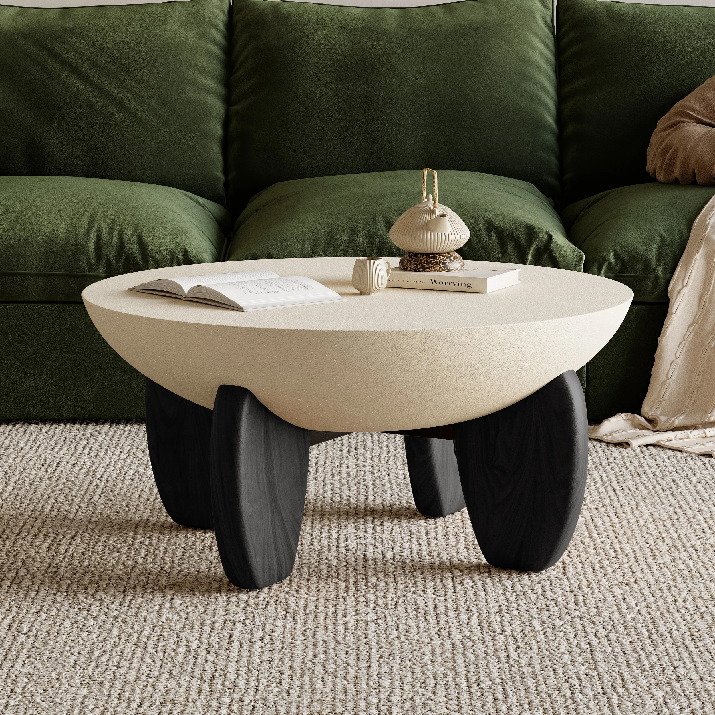 terra round concrete coffee table with ash wood legs and desert sand finish