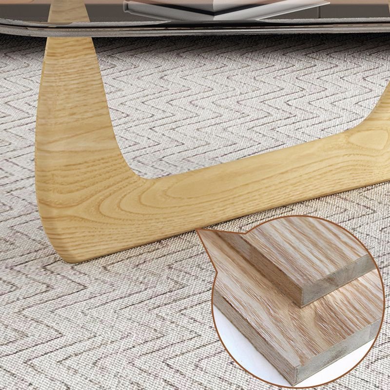 veyra modern triangular glass coffee table with wooden pedestal base