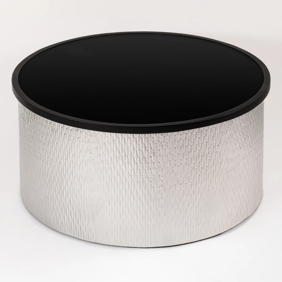 Aurea Cylindrical Coffee Table with matte black round top and hammered gold or silver cylindrical metal base, 81 cm diameter