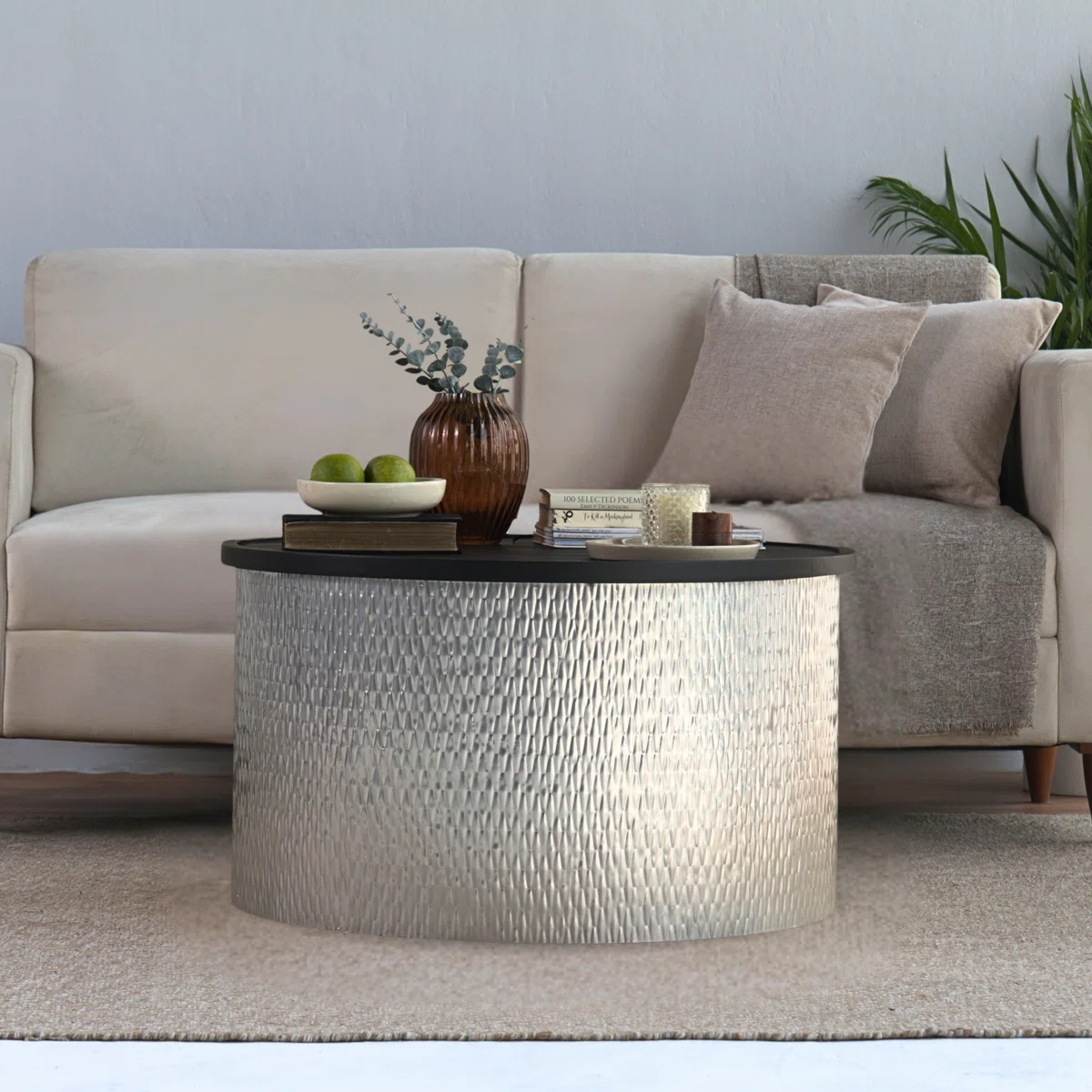 Aurea Cylindrical Coffee Table with matte black round top and hammered gold or silver cylindrical metal base, 81 cm diameter