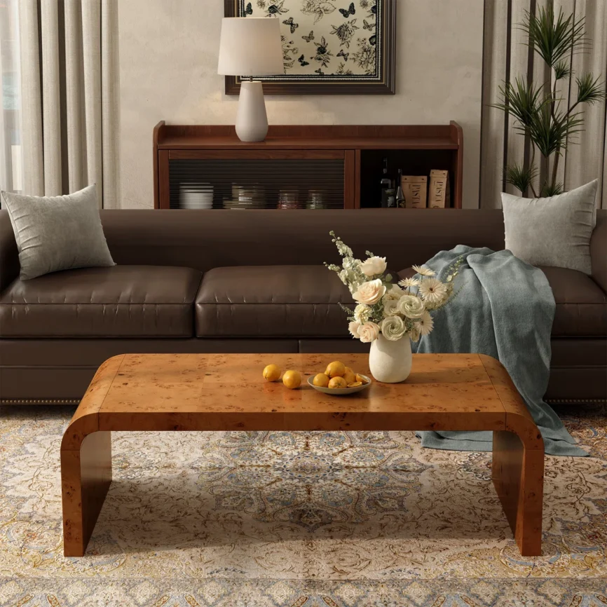 The Aurelia 122 cm Handcrafted Burl Wood Coffee Table is a statement of timeless artistry.