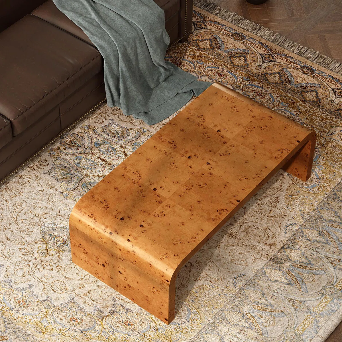 The Aurelia 122 cm Handcrafted Burl Wood Coffee Table is a statement of timeless artistry.